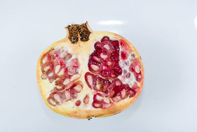 Close-up of fruit against white background