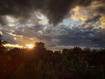 Scenic view of landscape against cloudy sky