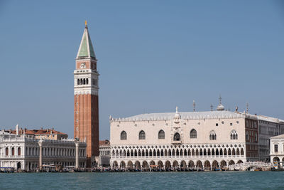 Classic view of venice with the doge's palace and st mark's tower on a clear sunny day.