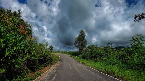 Panoramic view of road against cloudy sky