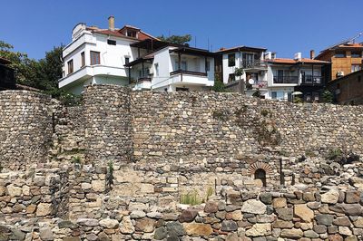 Brick wall of old building in city