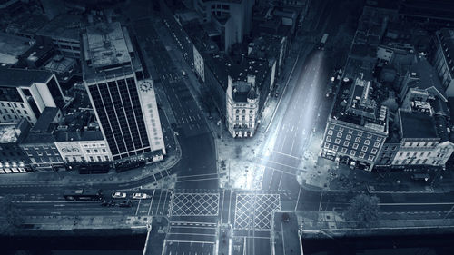 High angle view of illuminated buildings in city