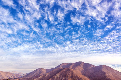 Scenic view of mountains at elqui valley against sky