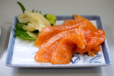 High angle view of fish in plate on table