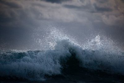 Waves splashing on rocks