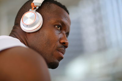 Close-up portrait of man looking away