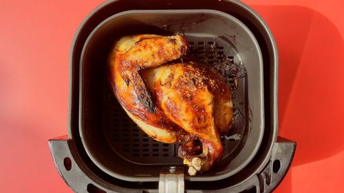 High angle view of meat on barbecue grill