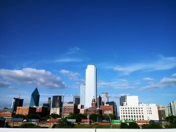 Modern buildings against blue sky