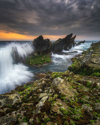 Scenic view of sea against sky during sunset