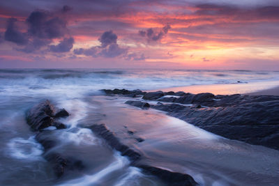 Scenic view of beach during sunset