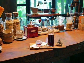 Close-up of bottles on table in restaurant