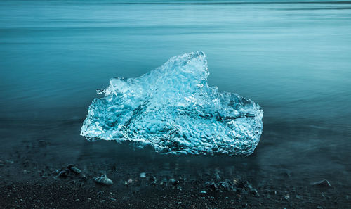 Frozen water in sea during winter