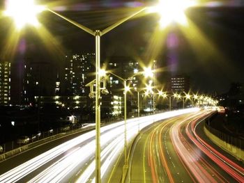 Light trails on city street at night