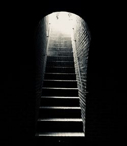 Low angle view of illuminated staircase in building