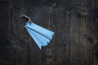 With love tags on wooden table