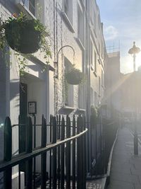 Street amidst buildings against sky