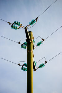Low angle view of electricity pylon
