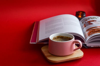 Close-up of coffee cup on table