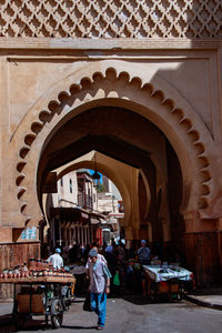 People in front of building