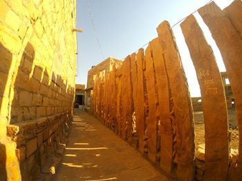 Narrow alley along buildings