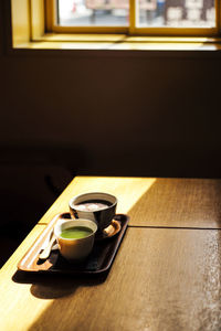Coffee cup on table