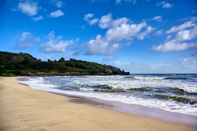 Scenic view of beach against sky