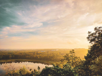 Scenic view of landscape against sky during sunset