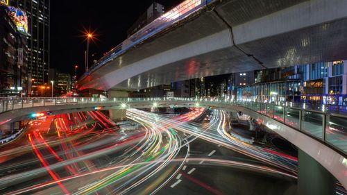 High angle view of light trails on road at night