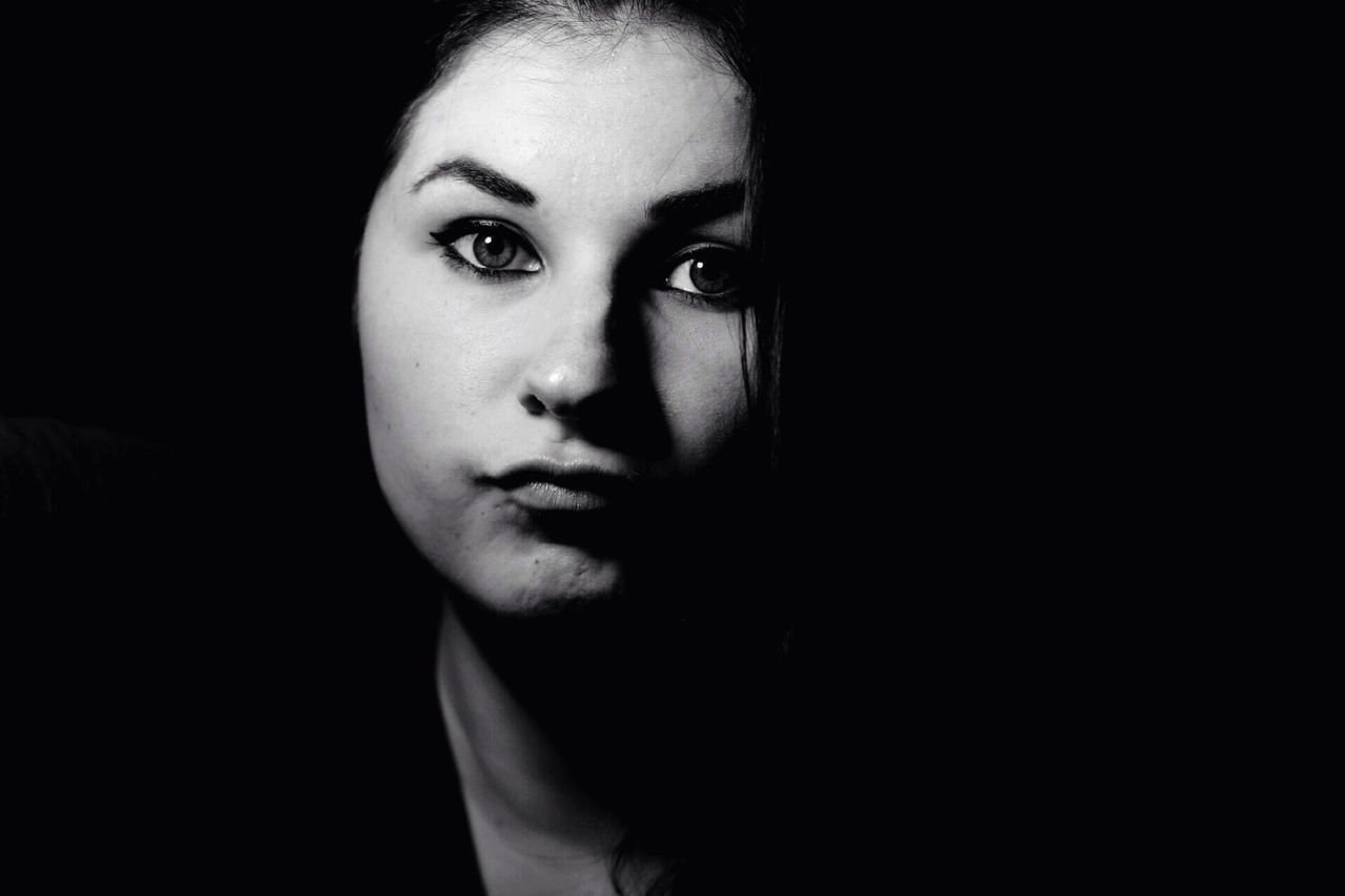 black background, studio shot, portrait, looking at camera, beautiful woman, human face, beauty, young adult, headshot, make-up, close-up, young women, beautiful people, one person, women, human body part, only women, one woman only, one young woman only, real people, adult, adults only, people, human hand