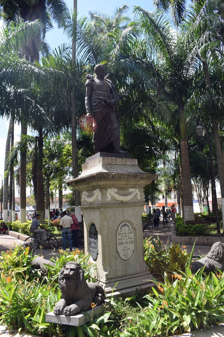 STATUE IN FRONT OF TEMPLE