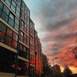 Low angle view of building against sky during sunset