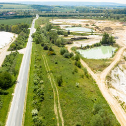 High angle view of road amidst field