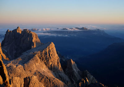 Scenic view of mountains against sky during sunset