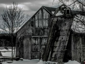 Abandoned house against sky