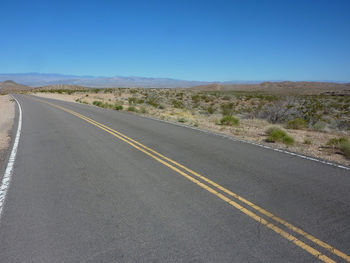 Road against clear sky