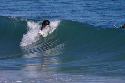 Man surfing in sea