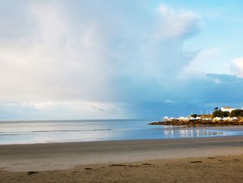 Scenic view of beach against sky