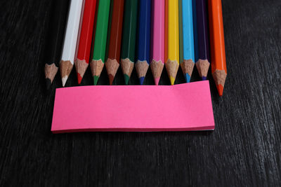 High angle view of multi colored pencils on table