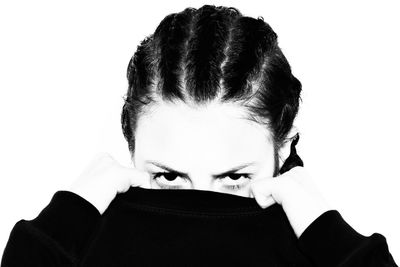 Portrait of woman against white background