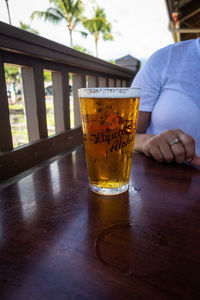 Glass of beer on table