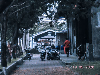 People walking on road in city