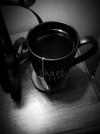 Close-up of coffee cup on table