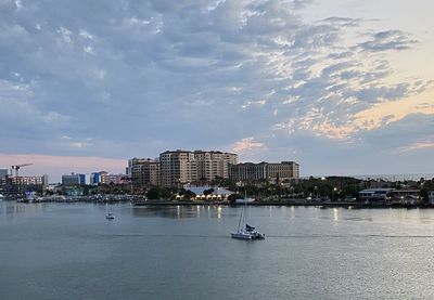 Scenic view of sea and buildings against sky