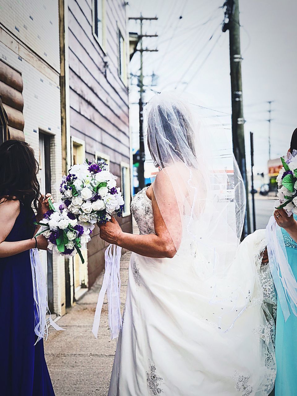 bouquet, real people, women, flower arrangement, celebration, flower, flowering plant, adult, wedding dress, event, bride, newlywed, wedding, lifestyles, two people, plant, standing, holding, ceremony, religion, wedding ceremony, positive emotion