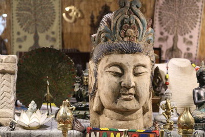 Close-up of statue against temple