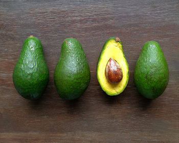 Close-up of green fruits on table