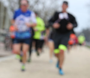 Group of people running outdoors