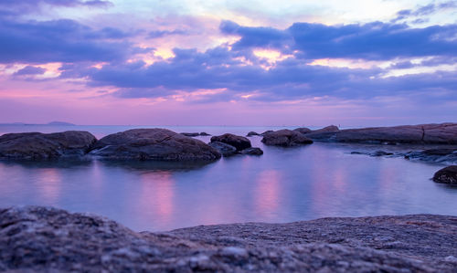 Scenic view of sea against sky during sunset