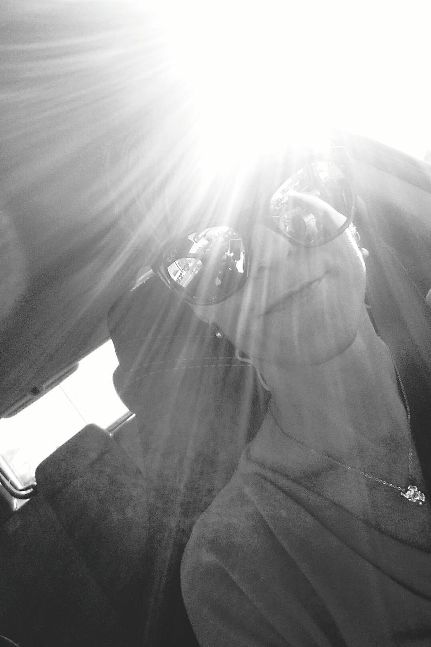 sunbeam, sunlight, lifestyles, lens flare, sun, leisure activity, sunny, day, men, car, travel, person, transportation, land vehicle, low section, bright, young adult, close-up