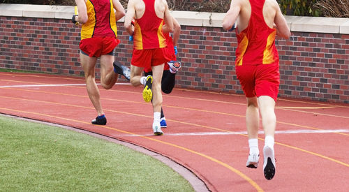 Group of people running outdoors